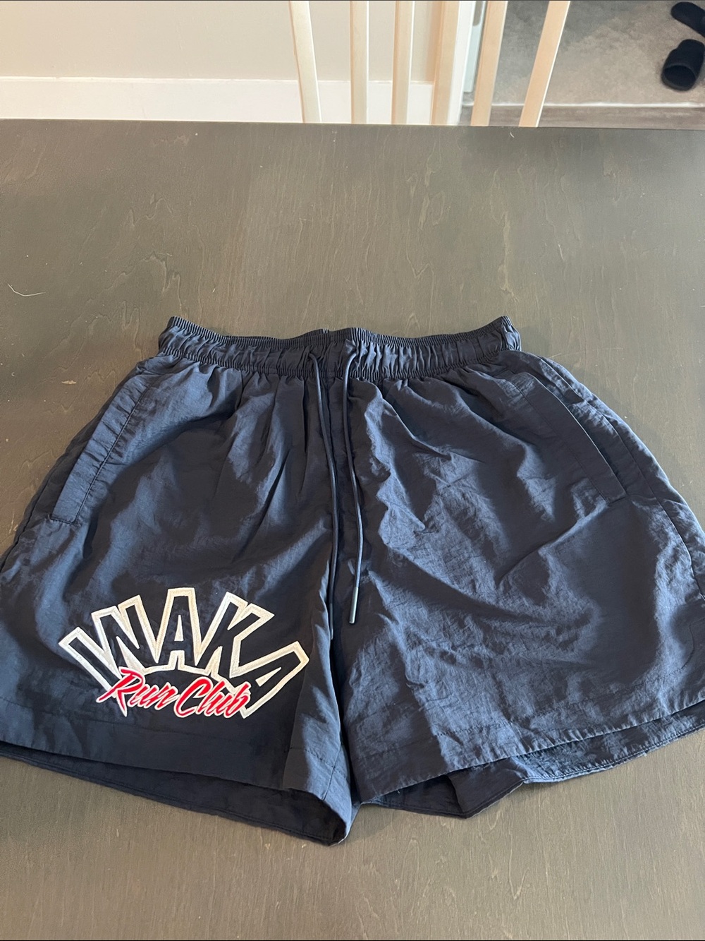 Inaka Power Navy Athletic Shorts with Run Club Graphic